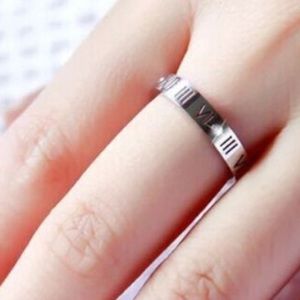 Roman Numeral silver-plated stainless steel & cz 7